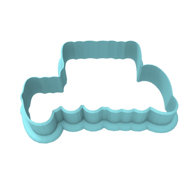 May include: A light blue plastic cookie cutter shaped like a vintage car. The cutter has a detailed design with a rounded body and a flat bottom.