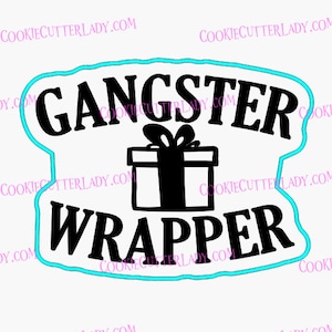 May include: A blue and white cookie cutter in the shape of a gift box with the text "Gangster Wrapper" above it.