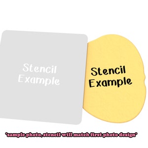 May include: A white stencil with the text "Stencil Example" on a yellow background. The text is in a handwritten font. "Sample photo, stencil will match first photo design" is written below the image.