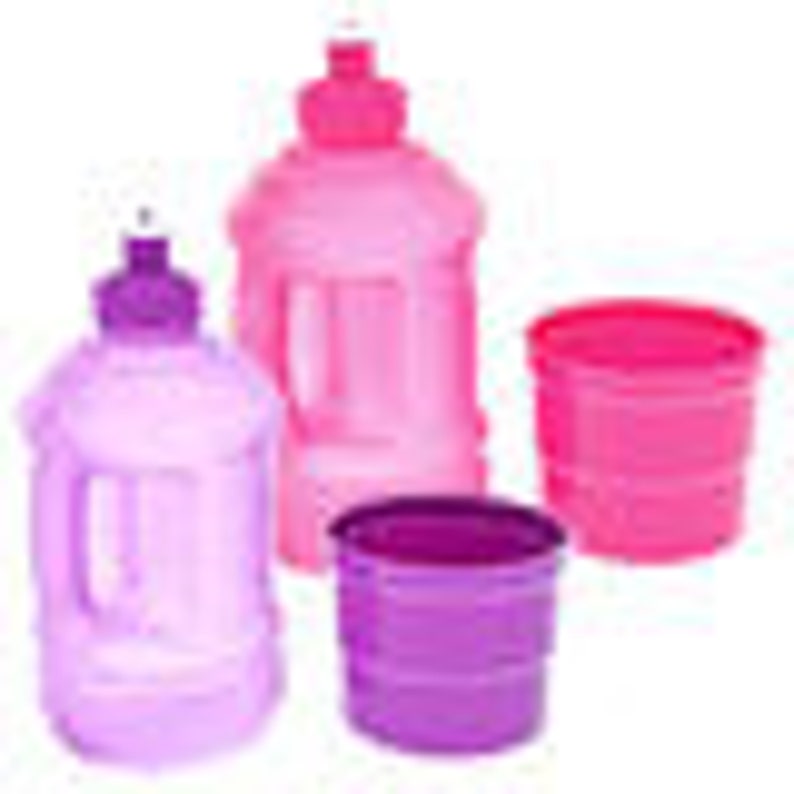 May include: Set of three plastic water bottles in pink and purple. The bottles have a handle and a spout. There are two smaller cups, one pink and one purple.