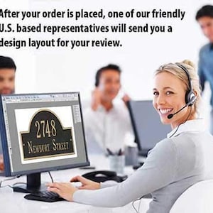 May include: A computer screen displaying a mock-up of a black and gold house number sign with the text "2748 NEWBURY STREET". A woman wearing a headset is sitting at a desk and looking at the camera.