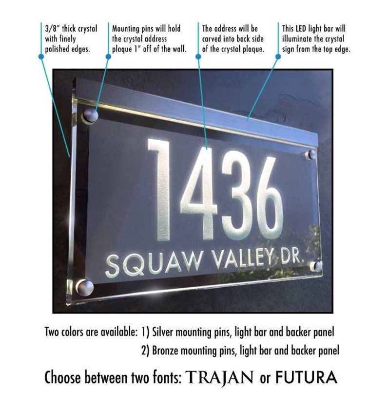 May include: A clear acrylic house number sign with the number 1436 and the street name "SQUAW VALLEY DR."  The sign is illuminated by an LED light bar.  The sign is available in two colors: silver or bronze.  The sign can be customized with two fonts: TRAJAN or FUTURA.