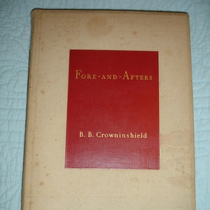 May include: A vintage book titled "Fore-and-Aftters" by B. B. Crowninshield. The book has a beige cover with a red rectangular label in the center. The title and author's name are in gold lettering. The book shows signs of age.