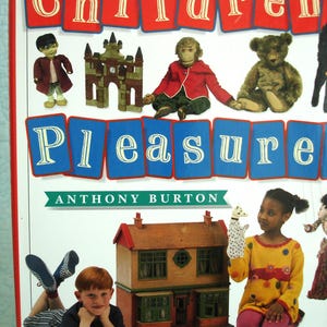 May include: A book cover with the title "Children's Pleasure" by Anthony Burton. The cover features various toys, including a doll, a monkey, a teddy bear, and a dollhouse. A child is shown with a puppet.