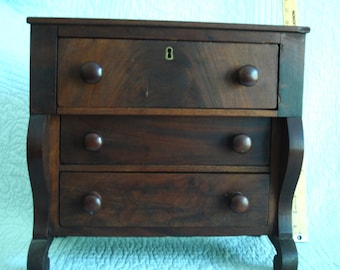 19th-century Empire period miniature chest of drawers, dating from roughly 1840 to 1860.