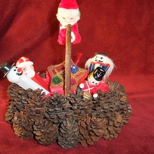 Christmas  Pinecone Basket Filled with Vintage Items:  Dakin climbing Santa, Pez, Wooden Ornaments, Sequined Box, Nostalgic Memorabilia
