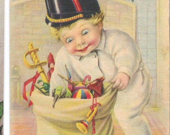 Antique Christmas Postcard Wide-Eyed Boy in Footed PJ's with Christmas  Sack of Gifts  C42