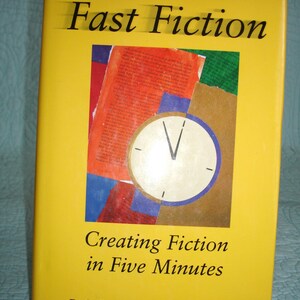 May include: A yellow book titled "Fast Fiction" with the subtitle "Creating Fiction in Five Minutes" by Roberta Allen. The cover features a clock graphic and a collage of colorful paper pieces.