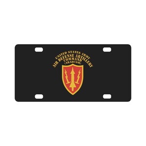 May include: Black license plate featuring the United States Army Air Defense Artillery emblem. The emblem is a red and gold shield with a stylized arrow and lightning bolts, and the text "UNITED STATES ARMY AIR DEFENSE COMMAND (ARADCOM)" in gold.