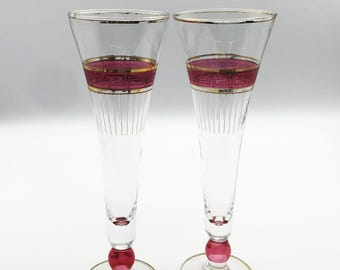 Two Champagne Flutes with Gold and Cranberry Trim 8 1/2 Inches Tall