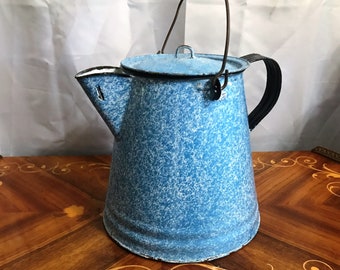 Sold at Auction: 12 GRANITEWARE COWBOY COFFEE POT