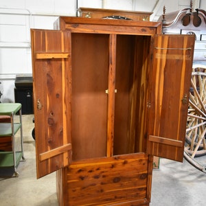 Antique cedar wardrobe store with mirrors