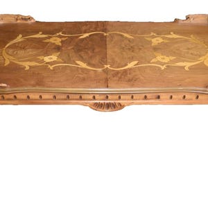 May include: A vintage wooden serving tray with ornate floral inlay and carved details. The tray has a rectangular shape with curved edges and cabriole legs. The wood has a warm, natural tone with a decorative floral pattern.