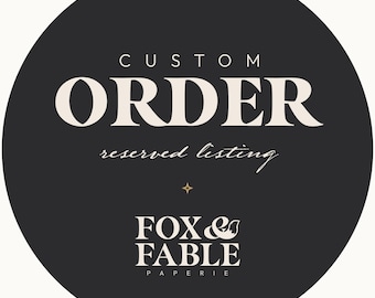 May include: A circular dark gray graphic featuring the white text CUSTOM ORDER and reserved listing in a serif font. Below this, a small four-pointed star icon sits above the white text FOX & FABLE PAPERIE, which includes a stylized fox tail.
