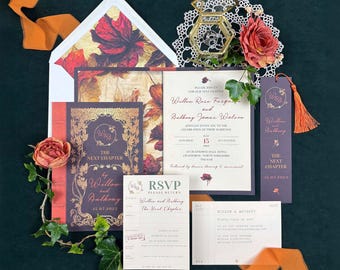 May include: A wedding stationery set featuring a dark purple invitation with gold foil botanical details, an RSVP card, a bookmark with a tassel, and an envelope with a fall leaf liner. A glass ring box and artificial flowers are included.