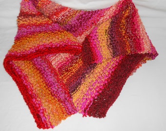 Multicolored wool baby blanket in red, orange, yellow, pink and more.