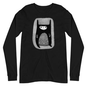 May include: Black long-sleeved t-shirt featuring a white graphic of a cartoon monster with a sad face and many eyes.