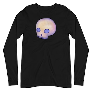 May include: Black long-sleeved t-shirt with a cartoon skull graphic. The skull is yellow with purple eyes and a purple mouth.