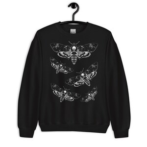 May include: Black sweatshirt with a white print of multiple death's head hawk moths.