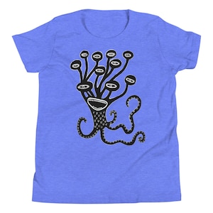 May include: A blue youth t-shirt with a black and white graphic of a multi-eyed creature with tentacles.
