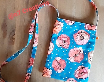 Turquoise blue shoulder bag with orange flowers