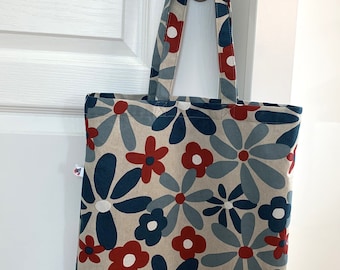 Tote bag with large blue and red flowers