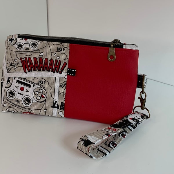 Trousse à maquillages en simili rouge avec un tissu « mangas »