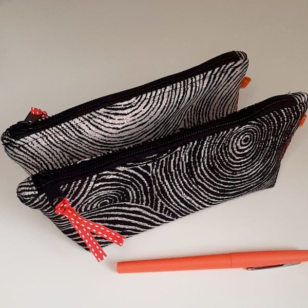 Trousse noires et dorées