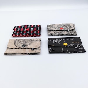Porte-cartes et billets noirs, rouges ou beiges