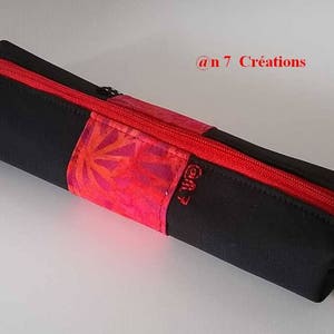 Small black and red school or makeup bag