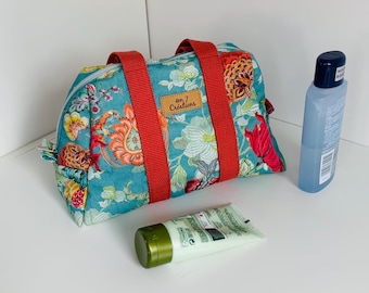 Large blue floral toiletry bag