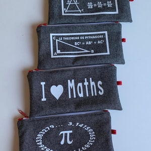 Gray and white pencil cases with a “mathematics” theme