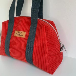 Grande trousse de toilette en velours rouge orangé