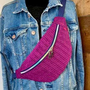 Purple embossed fanny pack