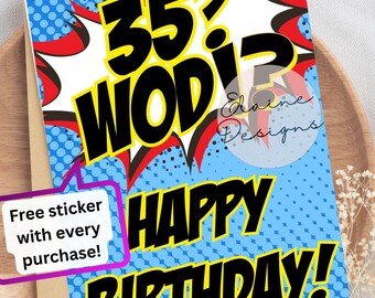 May include: A birthday card with a comic book design. The card displays the text "35? WODi? HAPPY BIRTHDAY!" in bold, yellow and black lettering against a blue background with white dots. The card also includes the text "Free sticker with every purchase!"