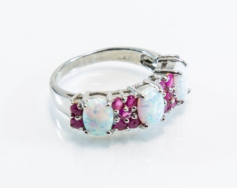 Oval Shaped Lab-Created Opal and Natural Ruby/Sapphire Ring