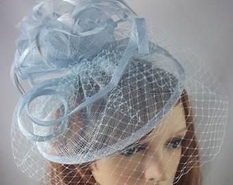 Pale Blue Sinamay Fascinator With Birdcage Veil - Occasion Wedding Races