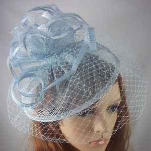 Pale Blue Sinamay Fascinator With Birdcage Veil - Occasion Wedding Races