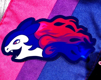 May include: A blue and pink cartoon dragon with a white face and sharp teeth. The dragon is on a purple, pink, and blue background.