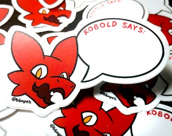 May include: A set of red and white stickers featuring a cartoon kobold with a moustache. The stickers say "Kobold Says:" and have a blank speech bubble for you to fill in.