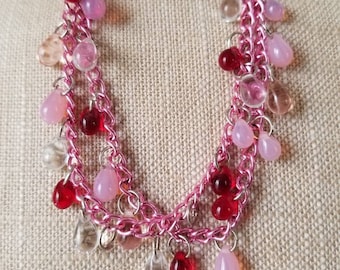 Pink and red beaded chain bracelet