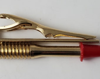 Swank Tie Clip Ramset Tornillo para mampostería con punta de anclaje roja