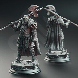 May include: A gray painted miniature figurine of an orc warrior wearing armor and holding a large axe. The figurine is standing on a circular base.