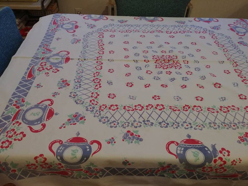 From "Pleasant Days Vintage" on Etsy. A similar, 30's era Tablecloth to Inez' gift to her mother.