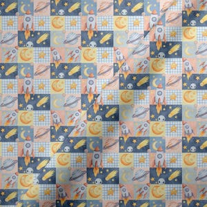 May include: A repeating pattern of space-themed squares. Each square features a rocket ship, planets, stars, moons, and comets in shades of blue, orange, yellow, and white. The background alternates between solid colors and a gingham pattern.