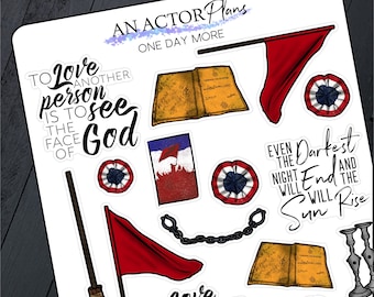 May include: A set of 10 stickers featuring quotes and images from the musical "Les Miserables". The stickers are printed on white paper with a glossy finish. The quotes include "To love another person is to see the face of God", "Even the darkest night will end and the sun will rise", and "An actor plans one day more". The images include a book, a chain, a broom, a flag, and a candlestick.
