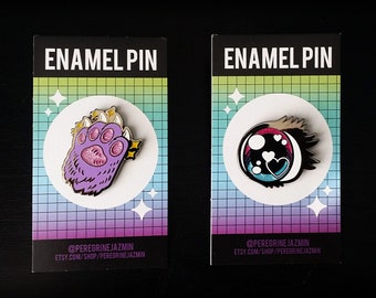 Kitty Paw y Shojo Eye Enamel Pins