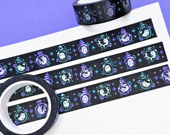 May include: Black and white washi tape with a repeating pattern of purple and blue potion bottles with ghosts inside. The tape is on a white background.