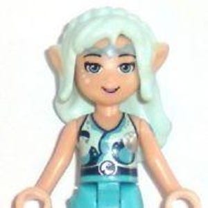 May include: A Lego mini-figure of a female elf with light blue hair, pointed ears, and a silver headband. She wears a turquoise top with a blue and white pattern and a matching skirt. The figure has tan arms and legs and is smiling.