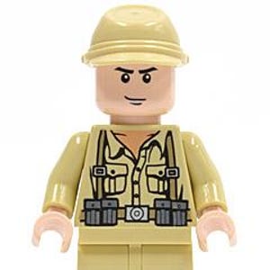 May include: A tan-colored Lego minifigure of a person wearing a safari outfit, including a helmet, button-up shirt with pockets, belt, and pants. The figure has a neutral expression.